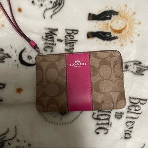 Pink and brown coach wristlet